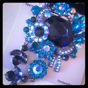 Blue flower pendant or brooch with dangle crystals